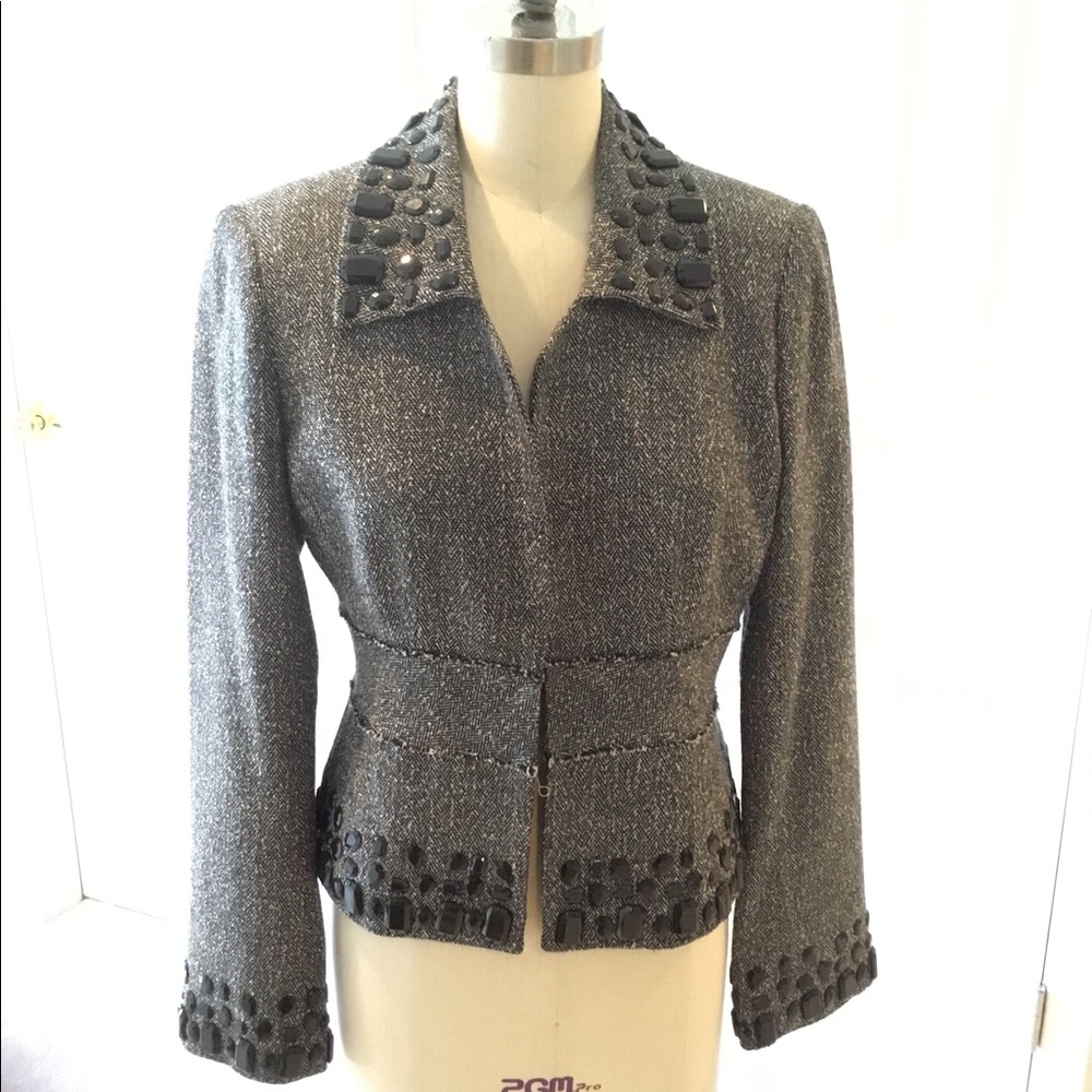 Black fitted jacket with black stone accents